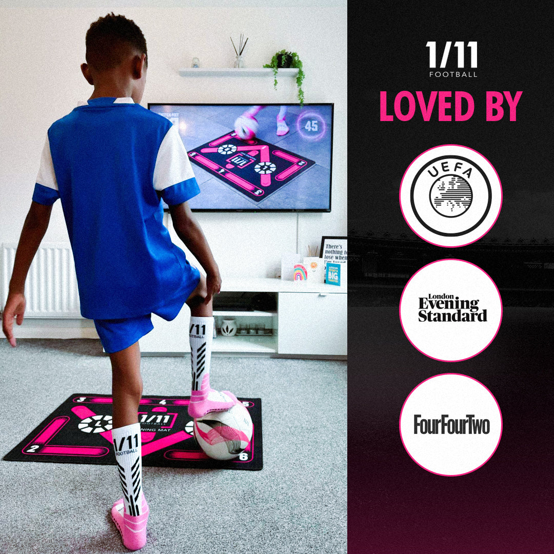 Young footballer practising on the pink training mat at home